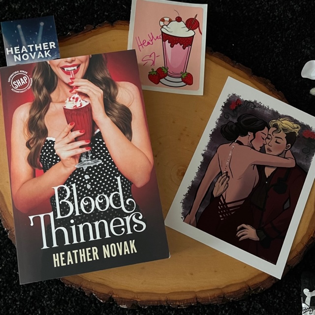 Look at this gorgeous artwork that goes with BLOOD THINNERS by Heather Novak both are in the Bawdy Bookworms LOVE ME DEAD Book Box! Check them out here ➡ bawdybookworms.com #nadinebookaholic #bookmail