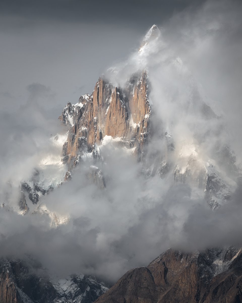 “Zabardast”
Mount Paiju peaks through the clouds. Taken from the Baltoro Glacier in the Karakoram range, Pakistan