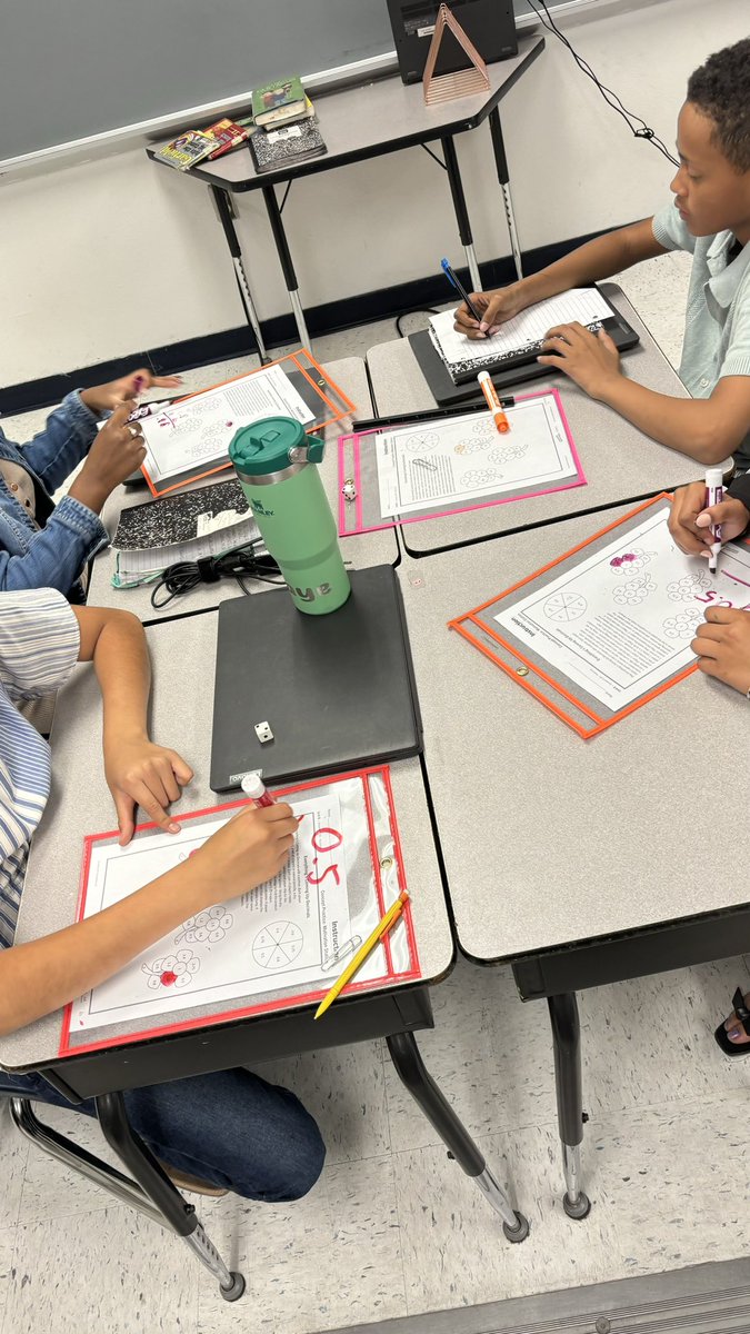 Lmarti_LCEs's tweet photo. The learning continues. My big kids are enjoying math stations today. All things decimals. #TurnItUp #5thgrademath https://t.co/xPVoY3kR0I