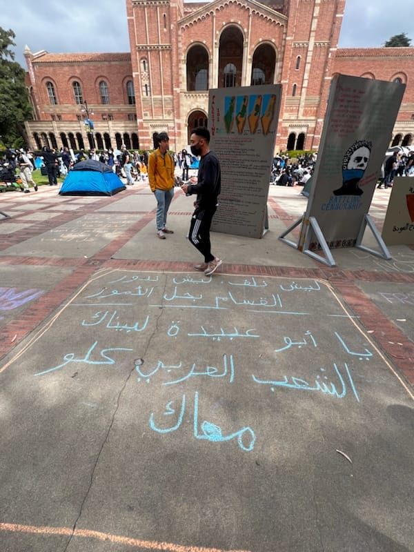 🚨UCLA pro-Hamas encampment by Royce Hall includes Arabic chalk graffiti that calls for extreme violence against Jews & Israel🚨 'Oh Qassam, oh beloved, we want to burn Tel Aviv' FYI - @UCLAchancellor