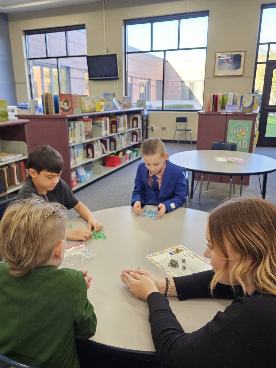 Solving, discovering, and enjoying numbers together at Family Math Night! @D59SaltCreek