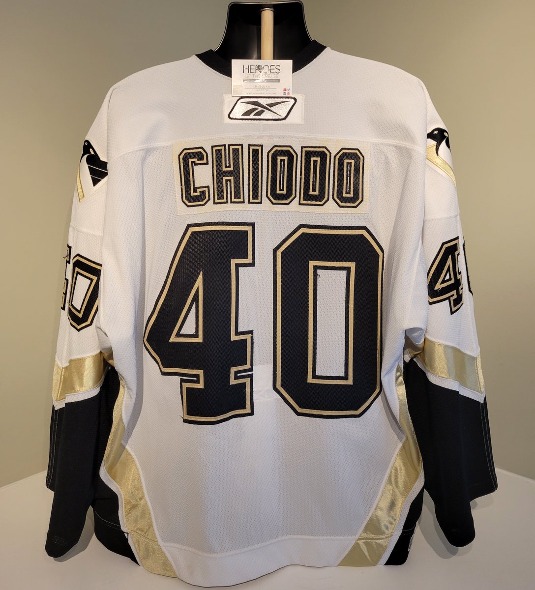 We are a day late for this former NHL goalie's birthday, but nevertheless, today's #PieceOfHistory is this #gameworn #PittsburghPenguins road jersey worn by Andy Chiodo in 2003-04. 

It was worn for his #NHL debut, as well as his first career NHL win among other games.