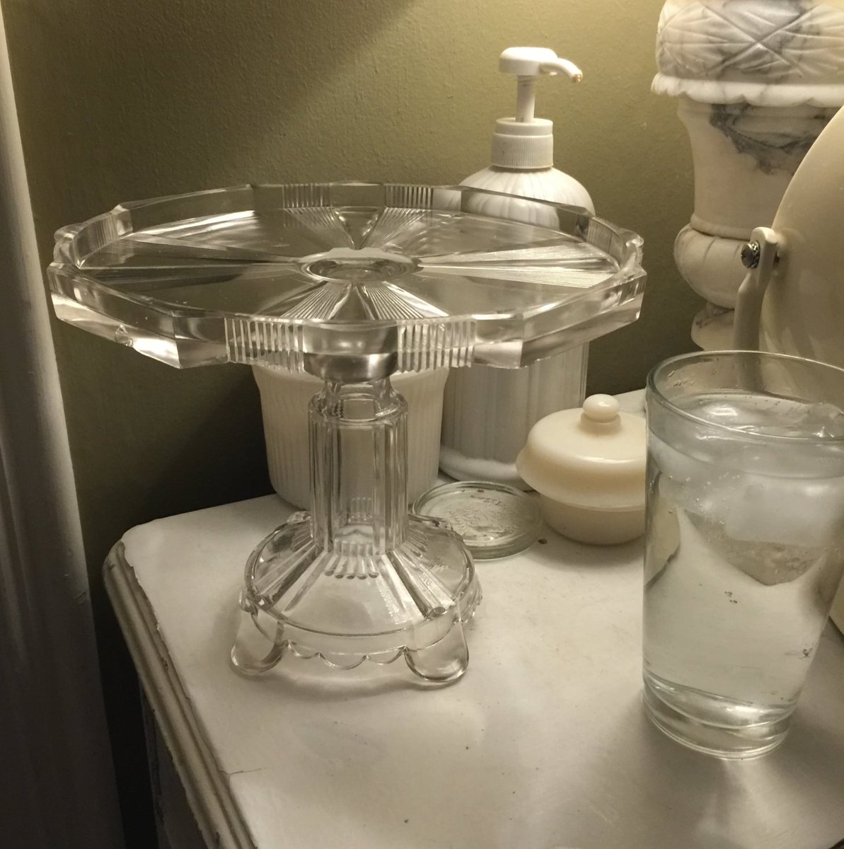 Got a great deal at my little church thrift shop today. A $3 1940 huge milk glass cake stand! On etsy someone's asking $97 for it. I collect them, clear glass, milkglass & silver (photo of partial collection) and the one I got for last year for $16, a gorgeous 1890s glass beauty.