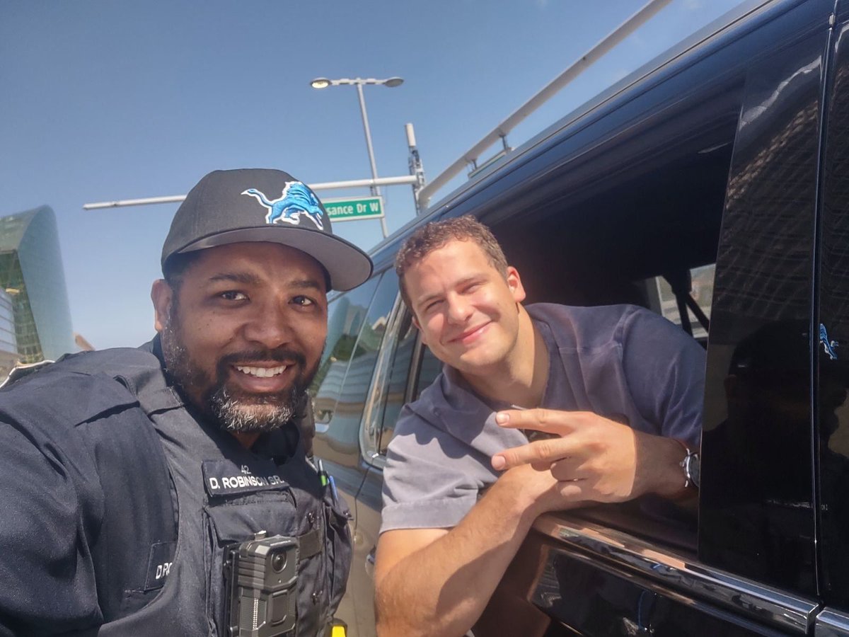 🏈 NPO Thee Ofc. D.Rob showing off his team spirit with Detroit Lions Star TE Sam LaPorta. GO LIONS!!!!!