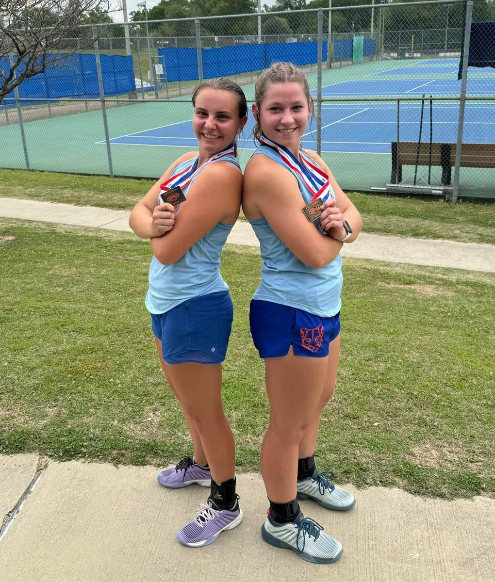 NCHSCougars's tweet photo. Meet “Back-to-Back” State Champs! Seniors Josie Tullos and Aleah McMullan! 🧡💙 #MakingNCHistory https://t.co/wzTWYYLSUW