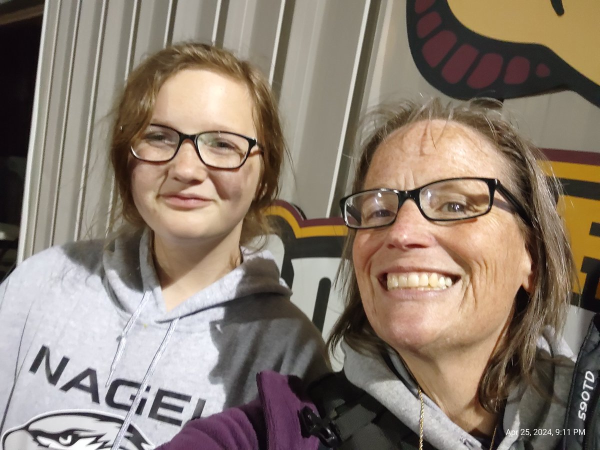 NighthawkATC's tweet photo. Someone went 2 for 2 and played her tail off behind the plate today. Then she had to go help me work the second half of the track meet after her game ended. @nagelathletics @KendallKaiser_ #MomsAssistant https://t.co/pPvCWUc9mJ