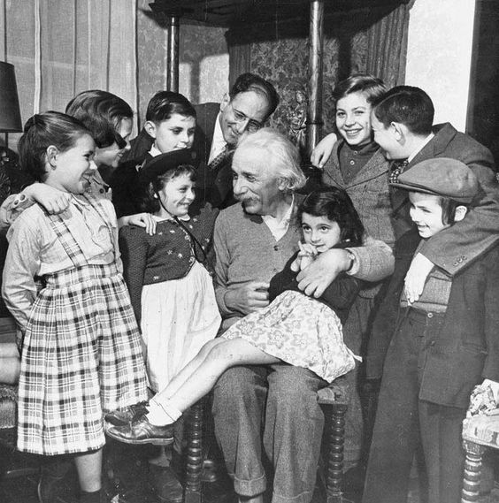 Albert Einstein at his 70ᵗʰ birthday party, 1949.
