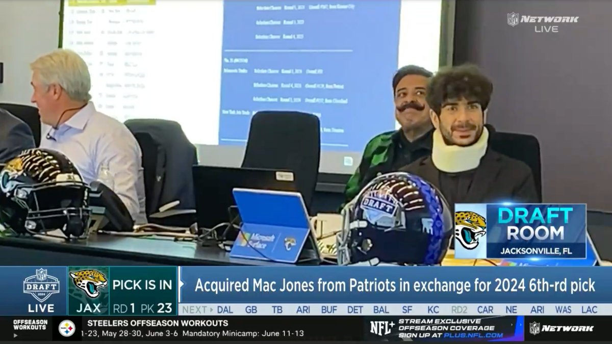 Tony Khan is wearing a neck brace in the Jaguars draft room 😭