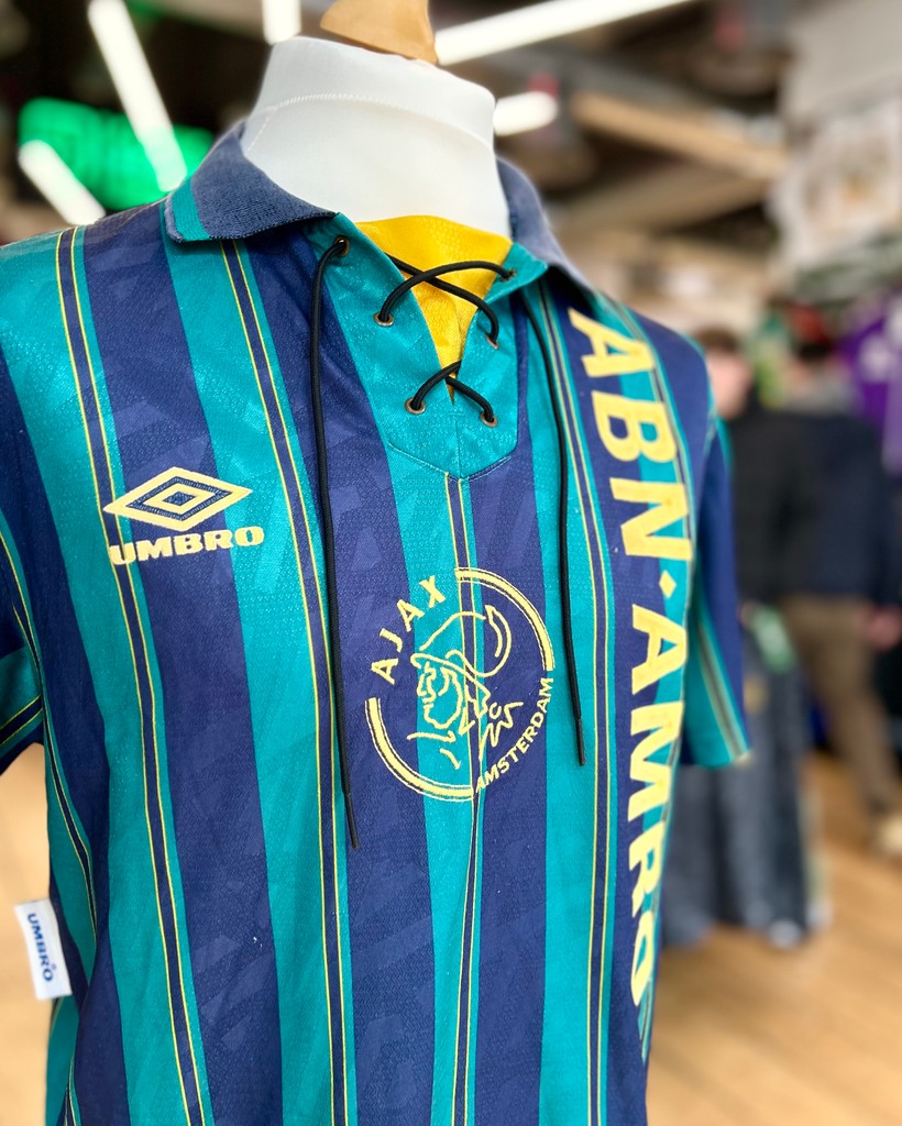 1993-94 Ajax Away shirt. The central badge, the vertical sponsor, that Umbro template... and the team wasn't too bad either. ⁠ ⁠ Available now in store.