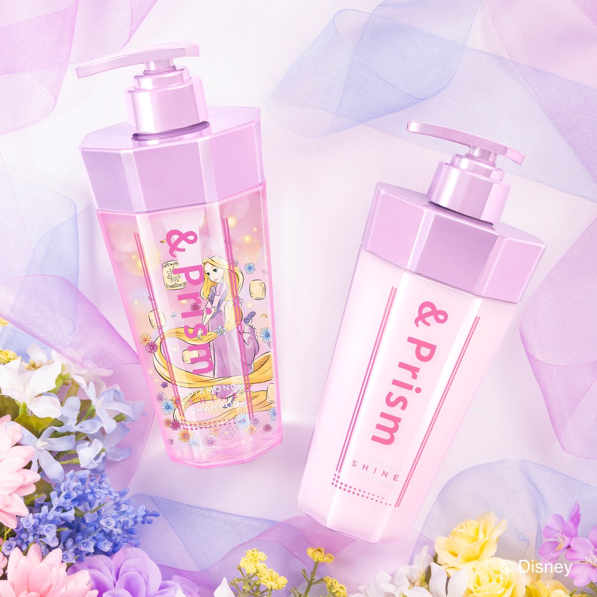 ラプンツェルのボトル、かわいすぎる〜〜💐ツヤッツヤの髪になれちゃうアンドプリズム ダイヤモンド シャインに限定デザインが登場💜お花に包まれたような華やかなトワイライトピオニーの香りだよ！4/25発売
