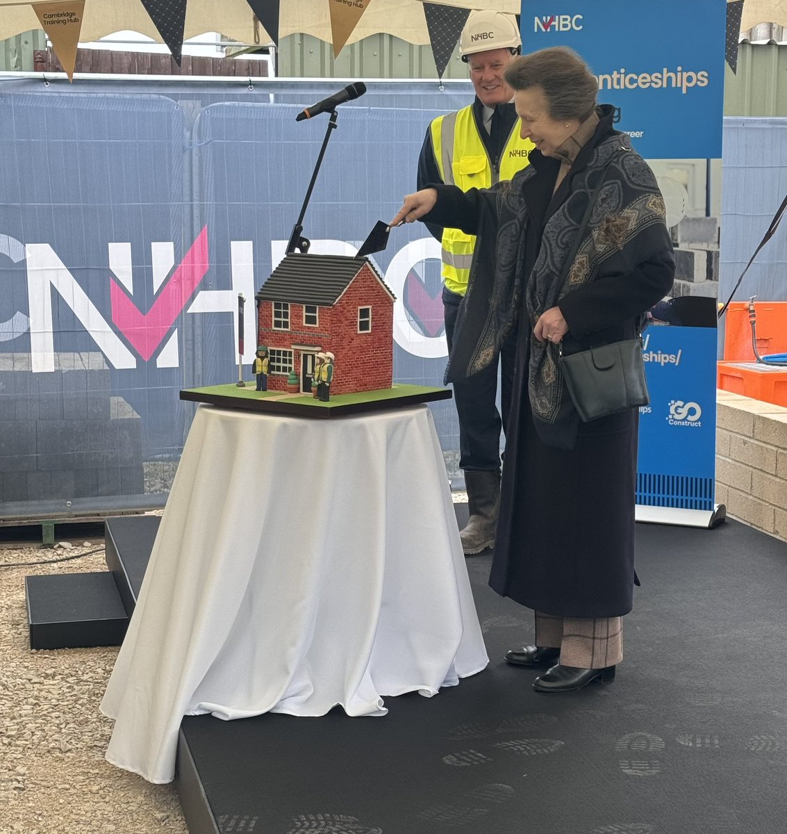 A great day welcoming HRH The Princess Royal to #Cambridgeshire to celebrate #WorldDNADay @illumina with 150 inquisitive children; to open the @NHBC apprentice hub at Histon, meet apprentices and cutting the most amazing cake (with a trowel): finally visiting @NWAngliaFT