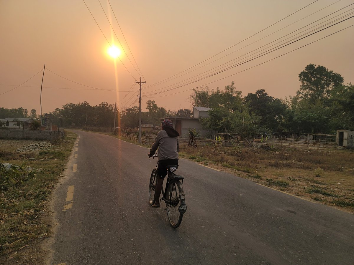 Good morning from Chitwan with two of its most iconic images - rhino & cycle.