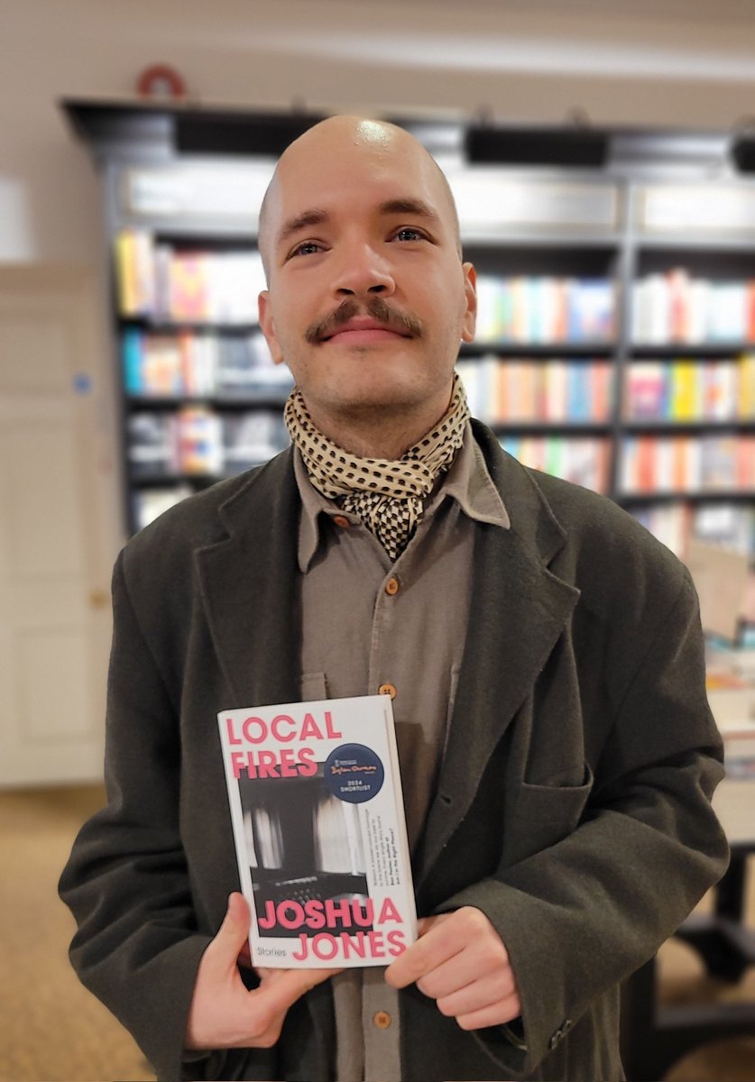 Doors open in 1.2 hours. Look who popped in - @nothumanhead, author of the Dylan Thomas prize-shortlisted #LocalFires! Joshua signed our stock whilst he was here! Of his book, just to be clear.