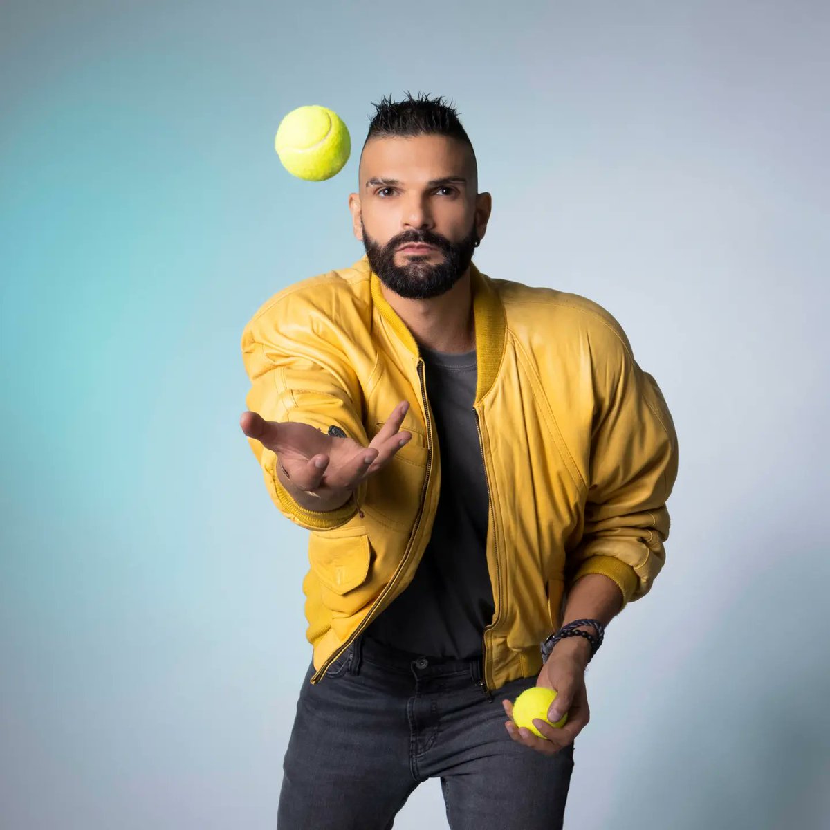 'Imagine a singer holding a tennis ball - both waiting for the perfect moment to strike a chord. Embrace your unique rhythm, and let your heart's song play on. 🎶🎾 #HarmonyInMotion' #mikemassy #مايك_ماسي