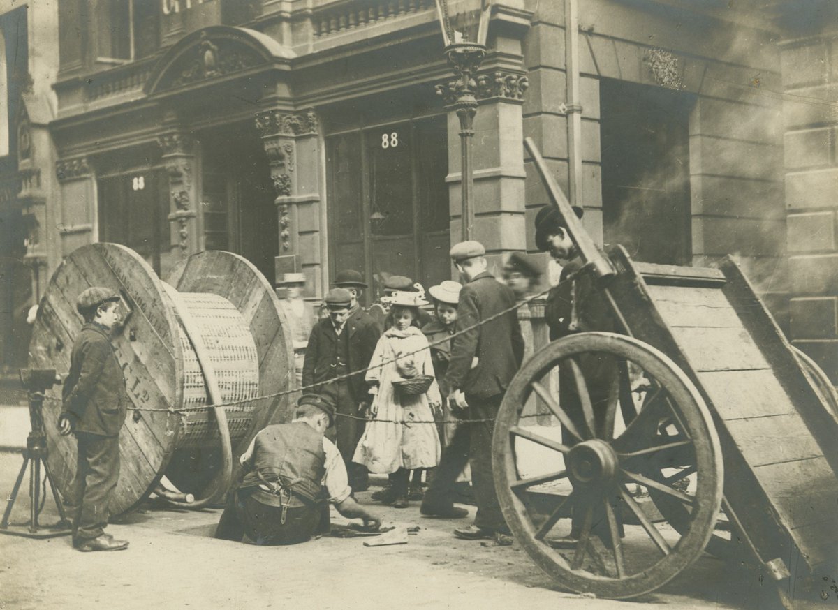 #PhotoFriday. A small group gather to watch new telephone cables being laid in Colmore Row in 1898. I wonder what they are thinking - 'this will never catch on?' Or 'where are the tin cans?!' Reference - Colmore Row 41 @LibraryofBham