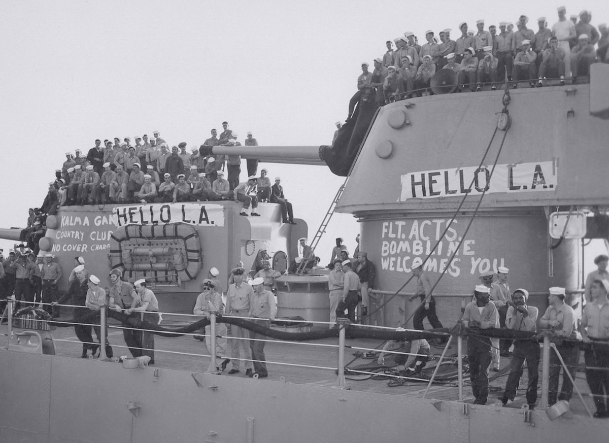 Date: Early May 1951. Location: The Wŏnsan Harbor, PDRK. Event: USN light cruiser Manchester is greeting heavy cruiser Los Angeles, destined to relieve the former after 10 month-long combat deployment. Current status: Scrapped in 1961-62, lifespan of 18 years.