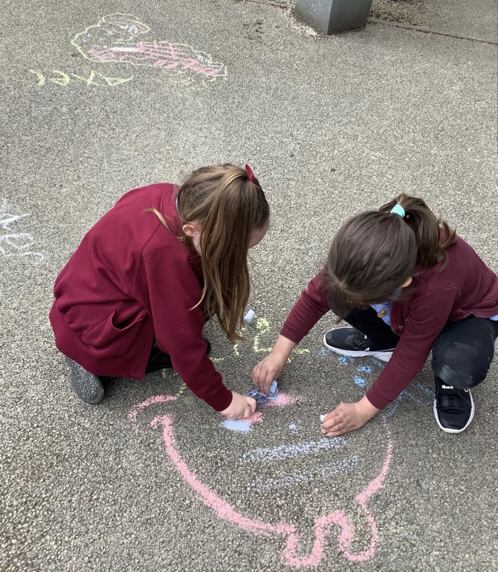 whitchurchprm's tweet image. During Outdoor Learning Week, 1CZ drew minibeasts with chalk and then added different textures, and decided to use the construction equipment to create a symmetrical butterfly.  #WPSRec #WPSOutdoorLearning