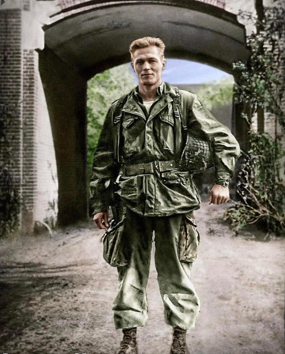 After Operation Market-Garden, Captain Dick Winters poses for a photograph in Holland outside of the building that became the headquarters for 2nd Battalion of the 506th Parachute Infantry Regiment. 🪂