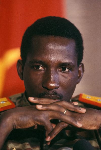 This is Thomas Sankara, former president of Burkina Faso, during his rule he refused foreign aids, built infrastructures, made Burkina self sufficient, planted 10M trees, vaccinated two million kids, condemned USA foreign policy. 
He was killed in a French backed coup in 1987.