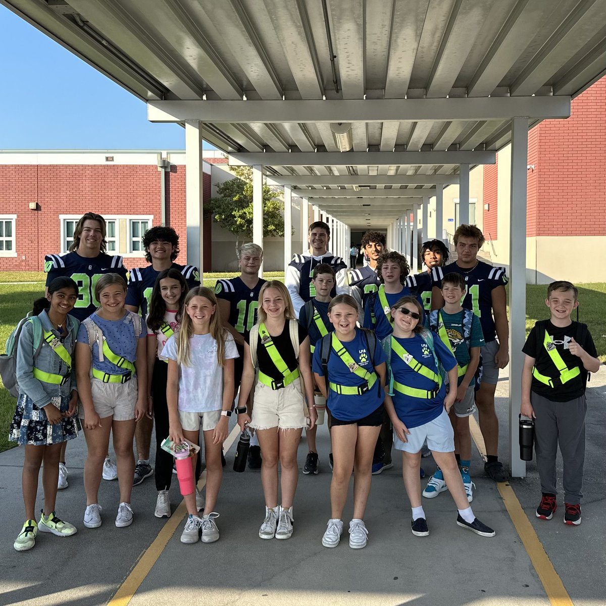 From the field to the car line, these young leaders are making a difference as positive role models in our community! Seeing the smiles on the faces of LPA students as our guys greeted them with cheer this morning was awesome! #BeachsideMade #BarracudaNation #LetsGetlt