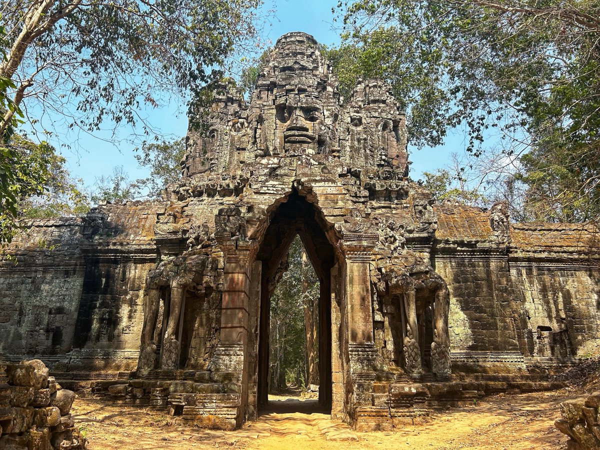 Back in Angkor! Pictured: The late 12th century Gate of the Dead, one of five colossal gateways granting access to the fortified royal centre.