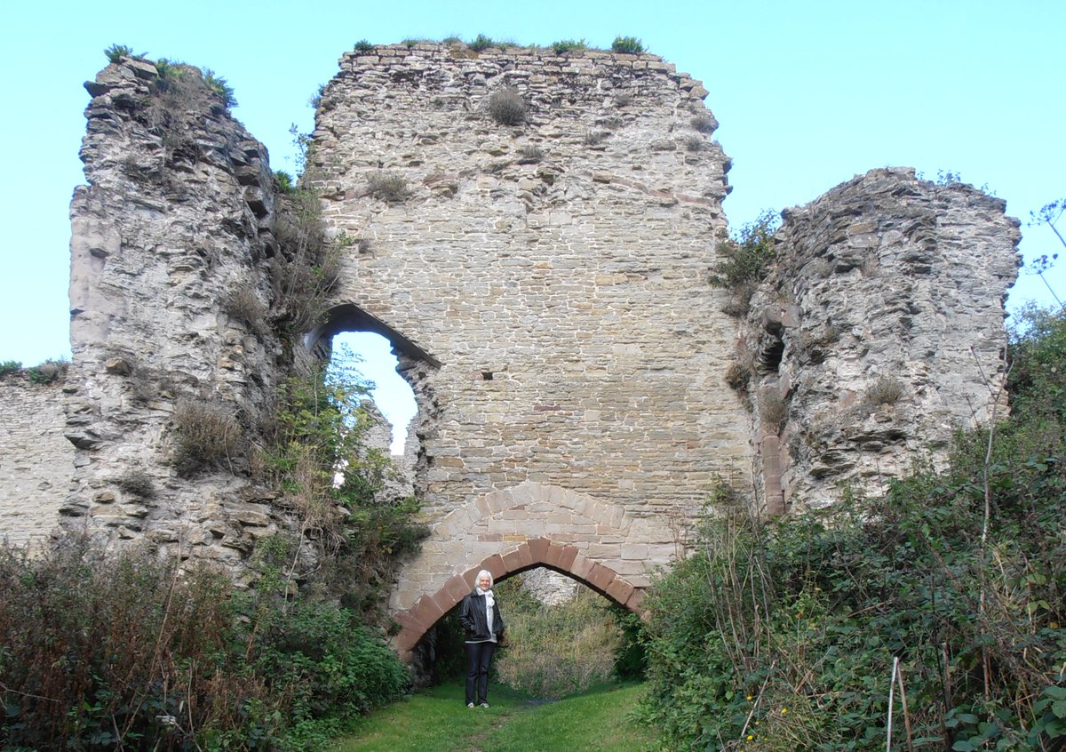 Another view of Wigmore Castle. The easily recognisable arch and walls of the original castle gatehouse, filled in by soil slips over the years.
