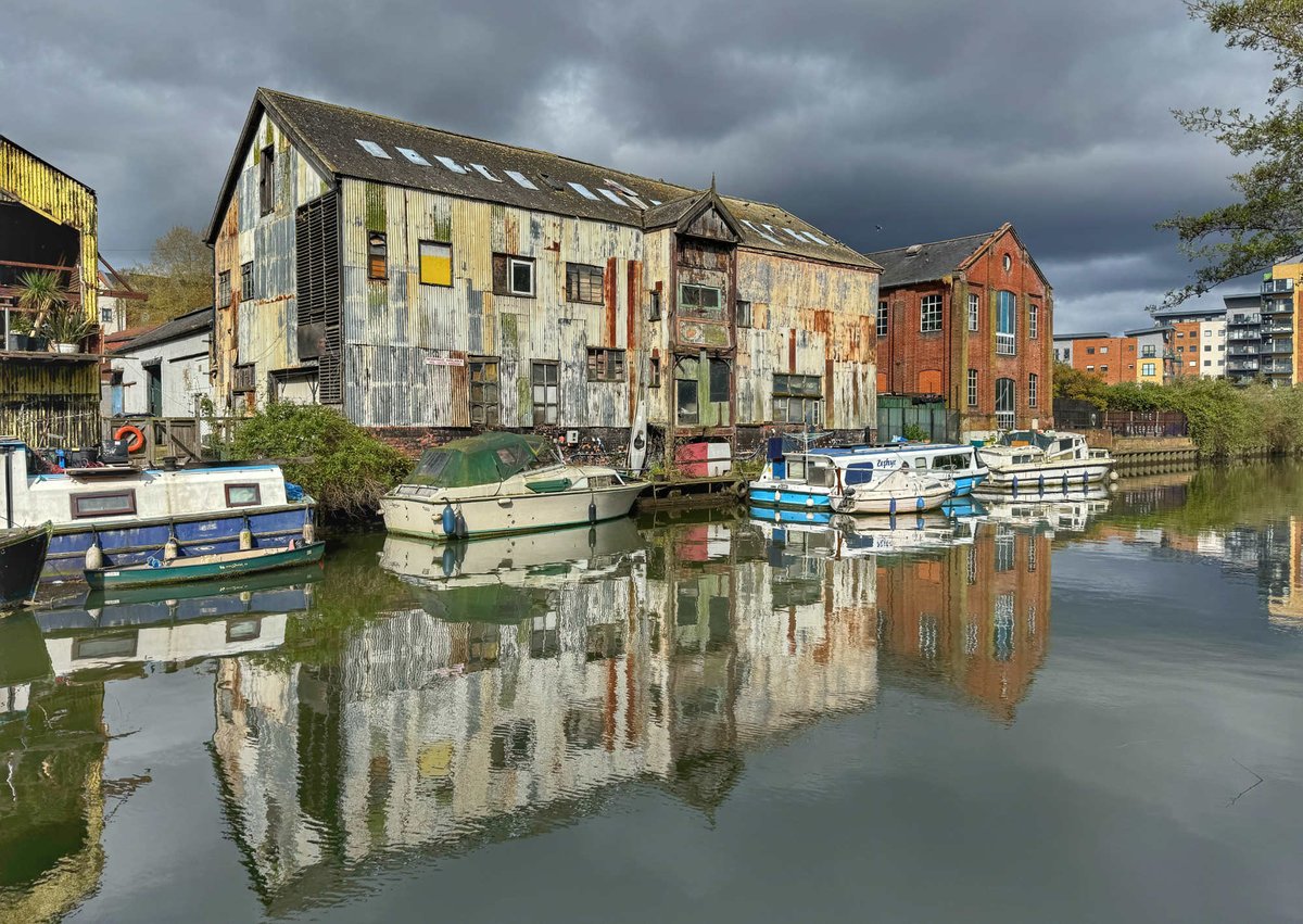 A moody sky along the River Wensum today. I love it when the sky is like this, the grey brings out the colour of the buildings so well. #Norwich