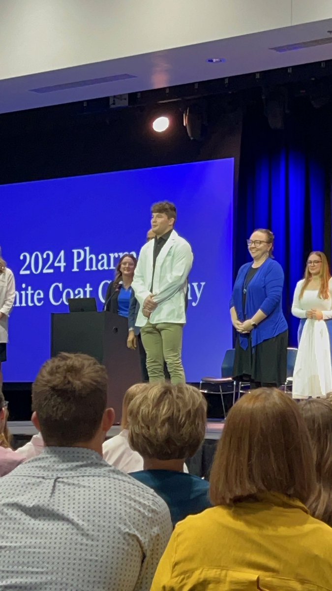 #FlashbackFriday Cade DeVos was awarded his white coat last week upon completion of his first year of Pharmacy School #GetJacked