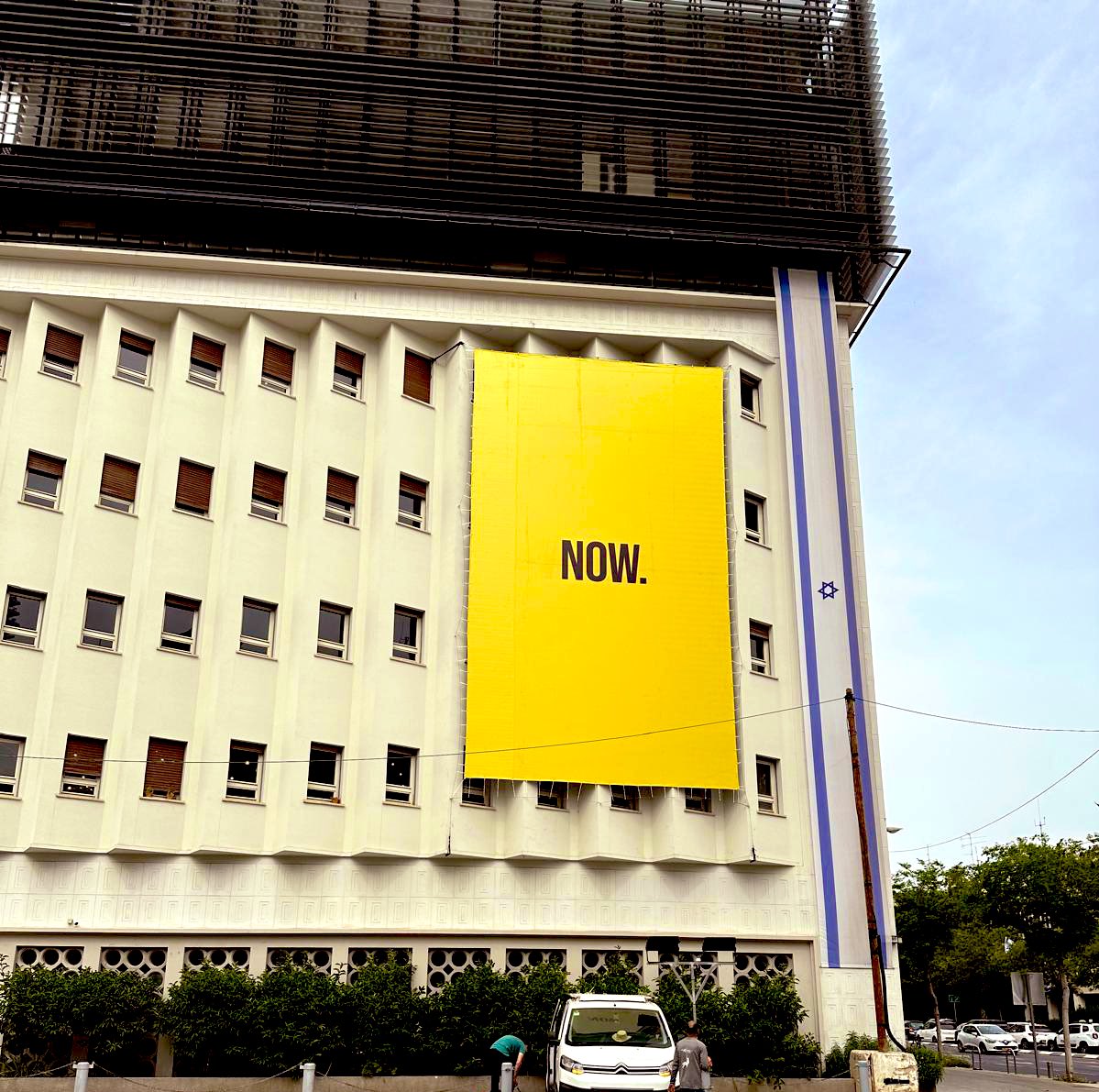 michakaufman's tweet photo. Another change of signs on our building. Can’t wait to be able to take it down #now #BringThemHomeNow https://t.co/v8U3KyRuke