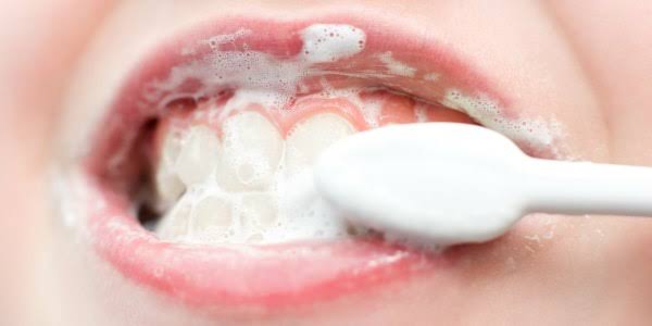 If not for proper hygiene and avoidance of mouth odour, brushing your teeth daily has no health benefit.