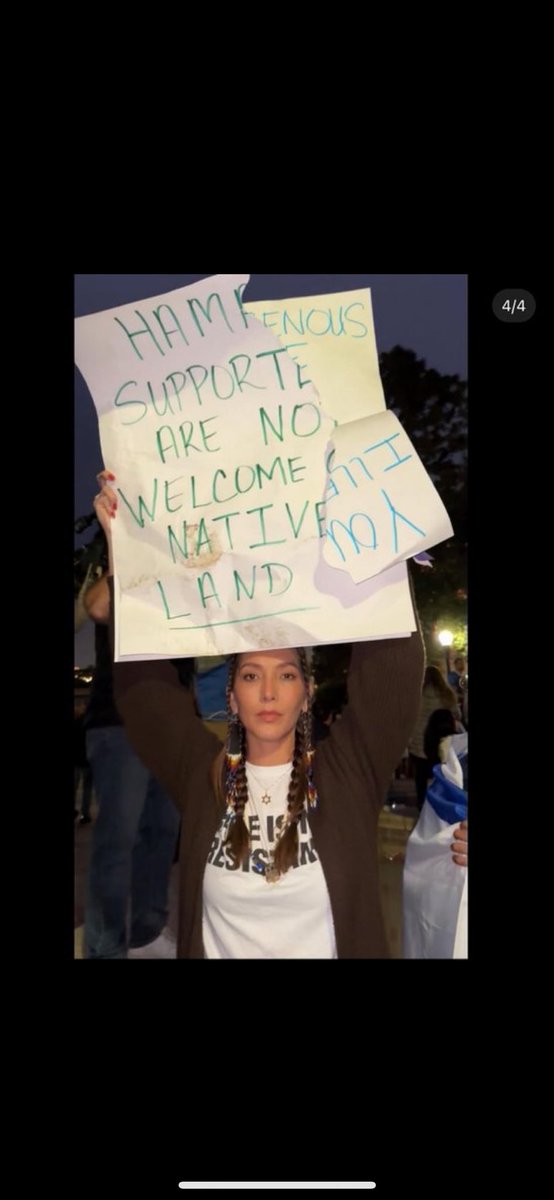 Her sign was destroyed by the protests.