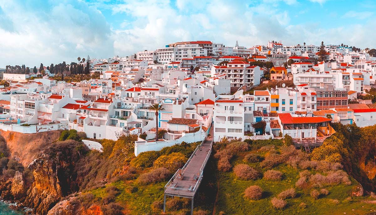 Albufeira is a popular resort town in the Algarve region of southern Portugal. It's known for its stunning beaches, vibrant nightlife, and charming old town. Ready to see Portugal for yourself? Our trips are designed by local travel experts: bit.ly/3W5TUlm