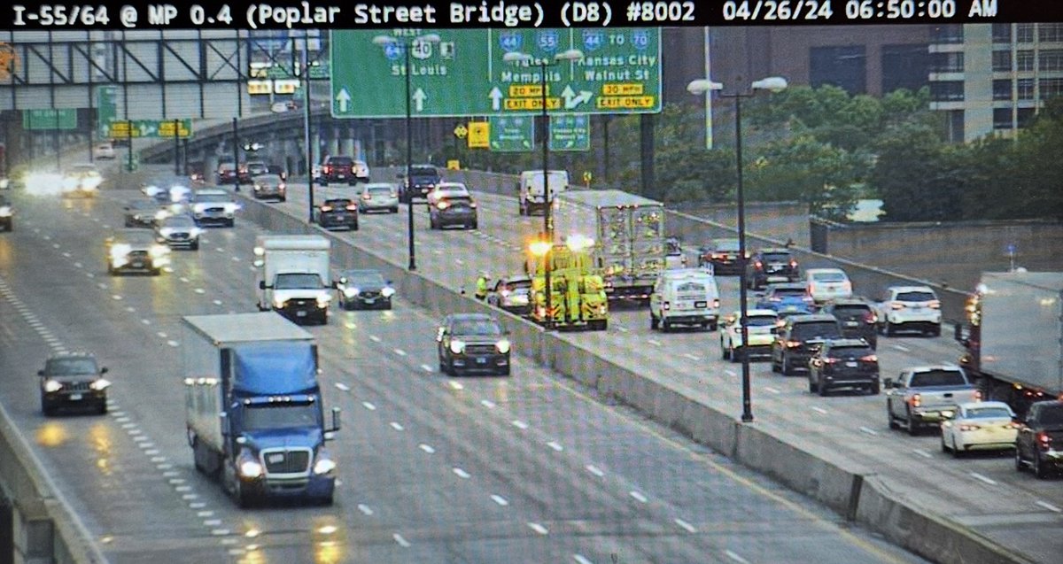 This accident westbound on the Poplar Street Bridge blocking the left lane is causing a jam for Illinois drivers right now.