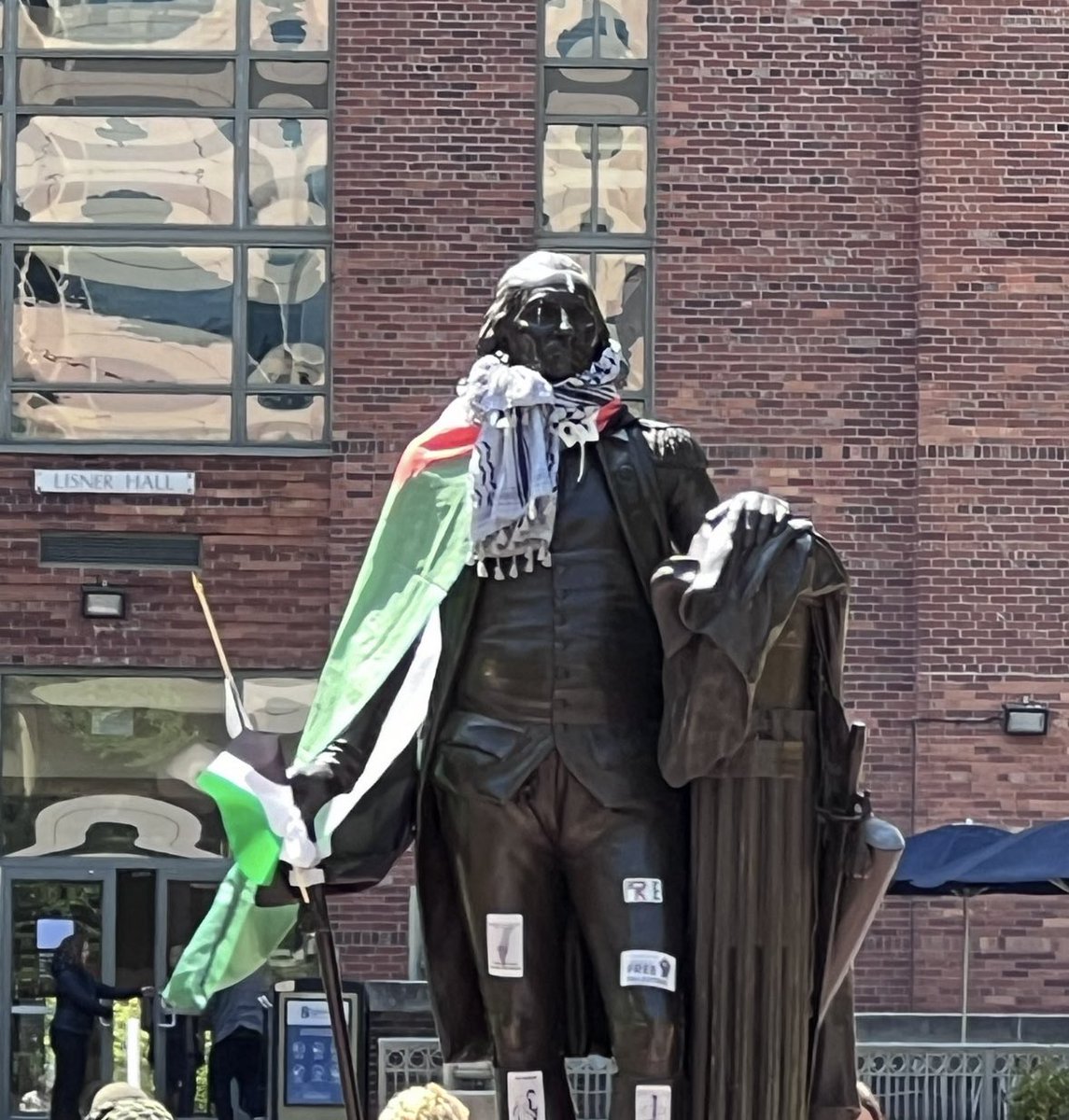 Protesters at GWU have dressed a statue of George Washington in a Palestinian flag and keffiyeh scarf: