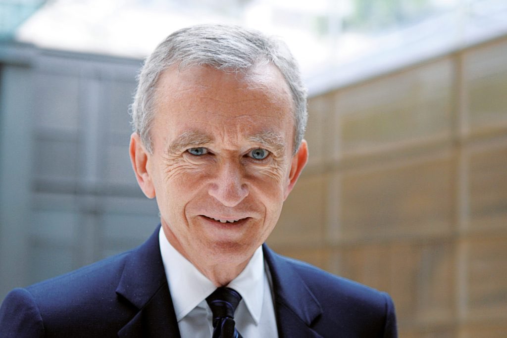 This is Bernard Arnault:Tthe richest man in the world. Networth: $23.5 billion How did he get so rich? Millions of people buy his stuff to look rich rather than being rich.
