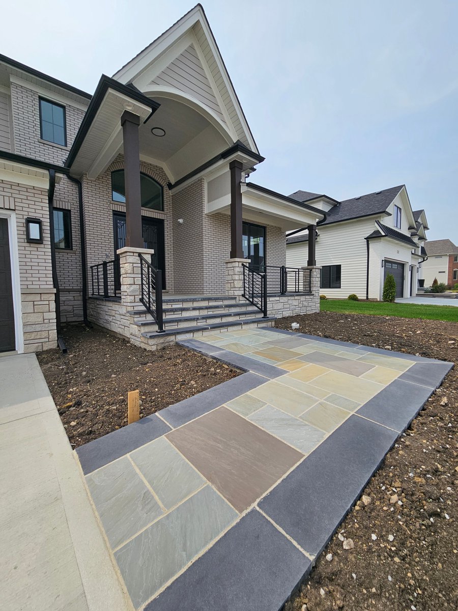 A beautiful and colorful front #walkway! Our #modelhome is open from 11 am - 5 pm at 4012 Alfalfa Ln #Naperville #newhome #newhomedesign #newhomebuilder #newhomeconstruction #homebuilder #homeconstruction #customhome #customhomebuilder #customhomebuild #newhomebuild #entryway