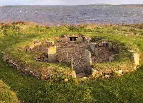 The Barnhouse Settlement, Orkney, Scotland. 

The patch of land featured in the photograph is a Neolithic village which was inhabited between 3300-2600 BC. A small group of people originally inhabited it, and the settlement features several small, round houses with turf cladding…