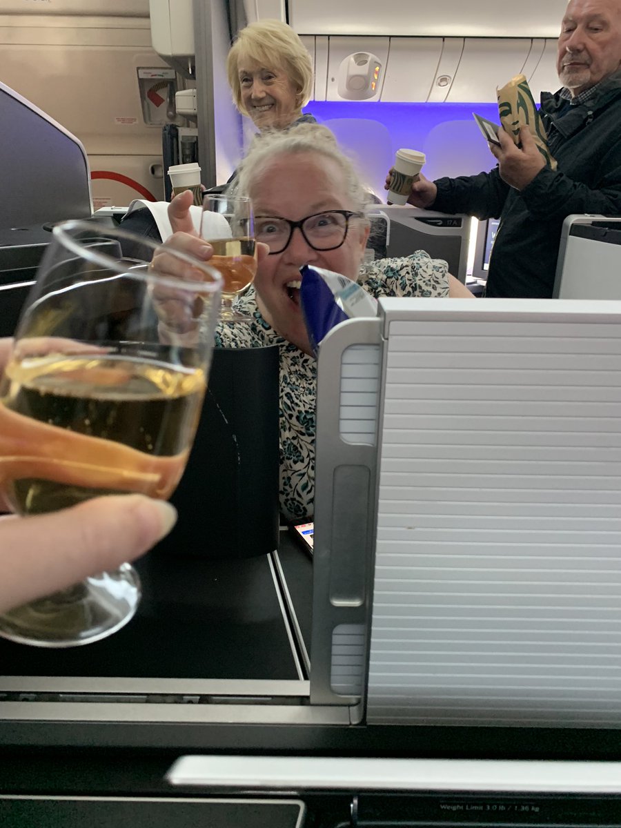 Two working class lushes only went and got upgraded. First mum/daughter trip in 5 years 🥂 New York here we come 🙌🙌 Look how happy that lady is for us losing our tiny minds 🥰