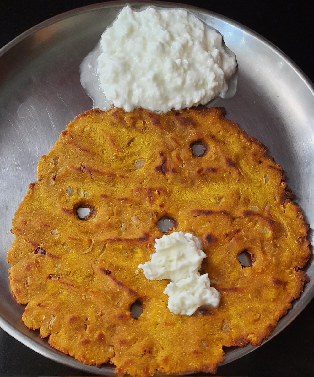 #smalleats #food #pune 
Healthy 'Small Eat' 
#Thaleepeeth with a blob of fresh butter and curd 
#HealthyEating #HealthyFood
