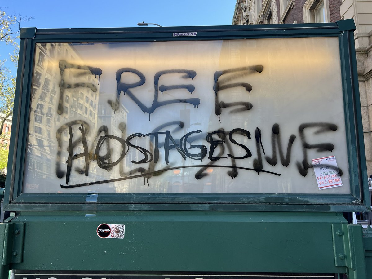 Pro-Israel protestors at Columbia U covered up the Palestine spray paint to read “hostages.”