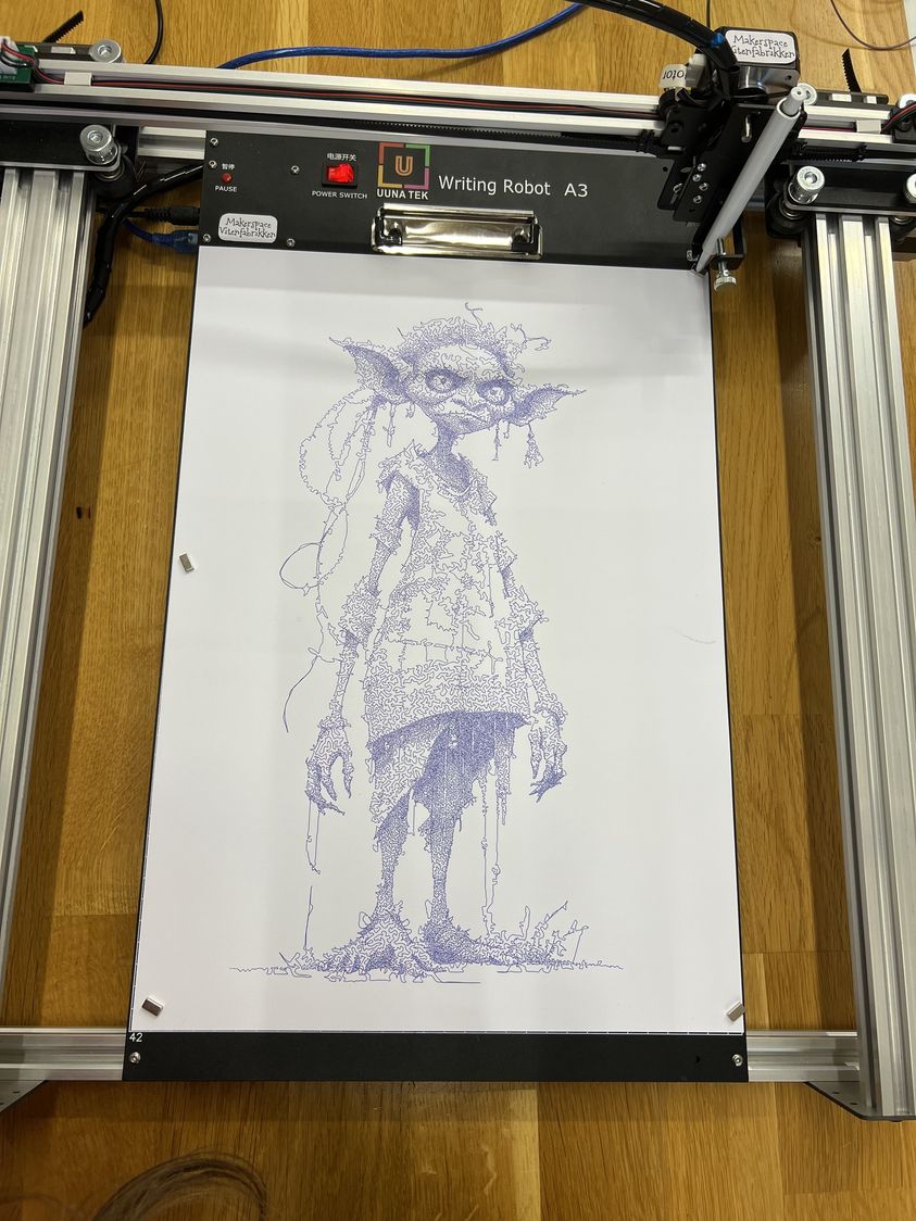 I am having fun with my AI troll woman. The pen is a free advertising ballpoint pen. @Hanne Madsen