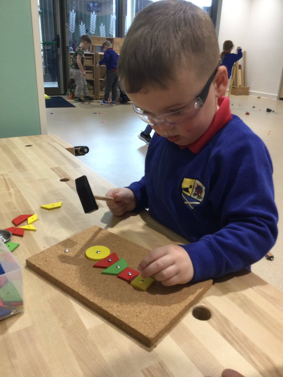 neilston_madras's tweet photo. We have loved exploring our new discovery area. Some children have been creative whilst using the shapes to make robots and rocket ships. They have shown good turn taking skills and developing hand eye co ordination when using the hammer and pins. #finemotor #responsiblelearners https://t.co/mGJu6ml2xr