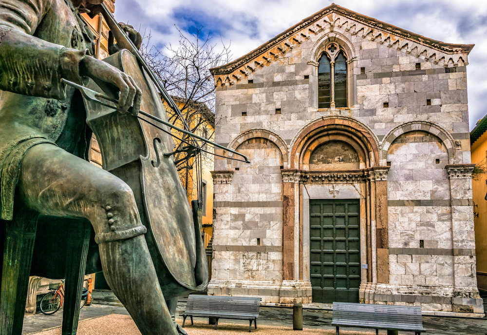 A statue of #composer and #cellist Luigi #Boccherini playing #cello in front of the Conservatory or #Music Institute named after him - Lucca, #Tuscany, #Italy. BenningViolins.com
