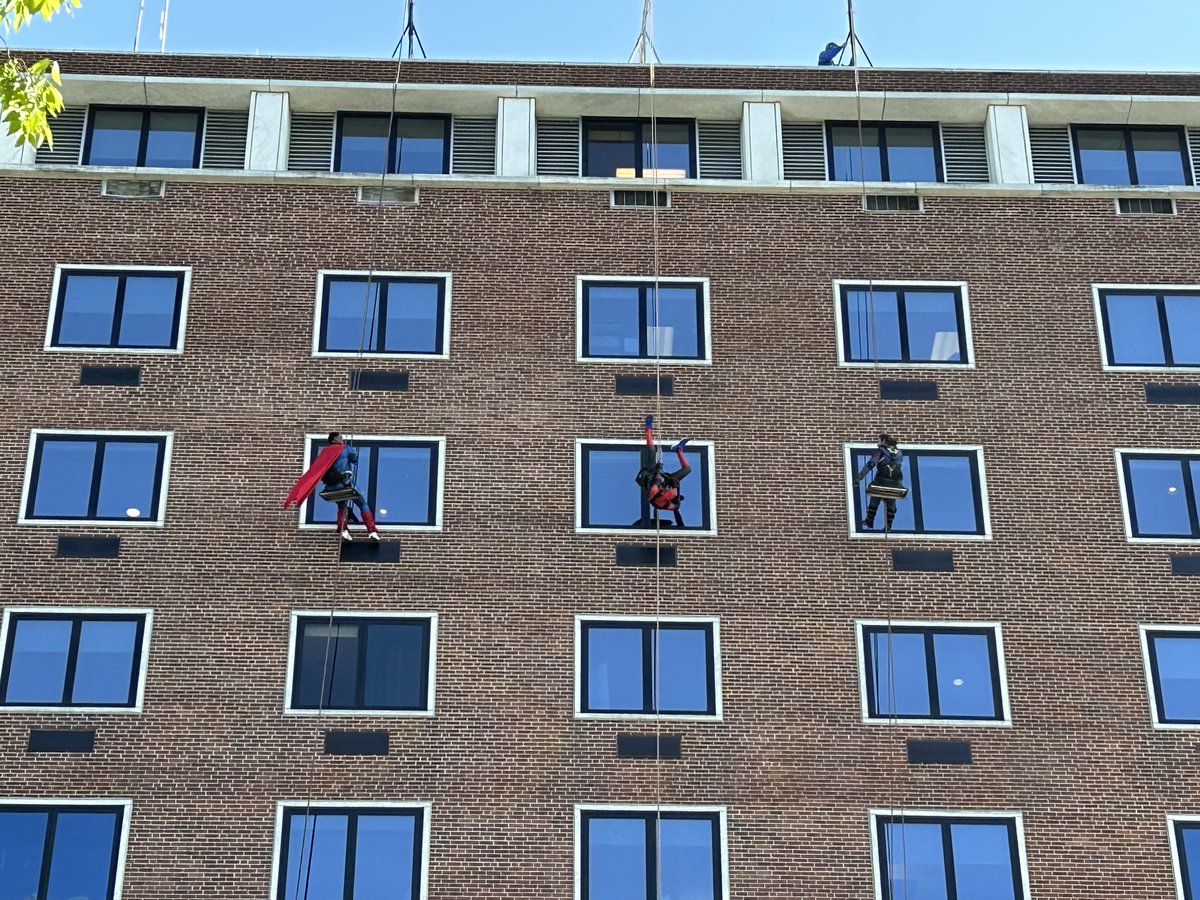 UPMC Children’s Harrisburg celebrated Superhero Day today with a visit from a few special guests! Window washers dressed as superheroes rappelled down the building to greet kids on the pediatric care floor. The hospital is also selling Superhero Day shirts to support patients.