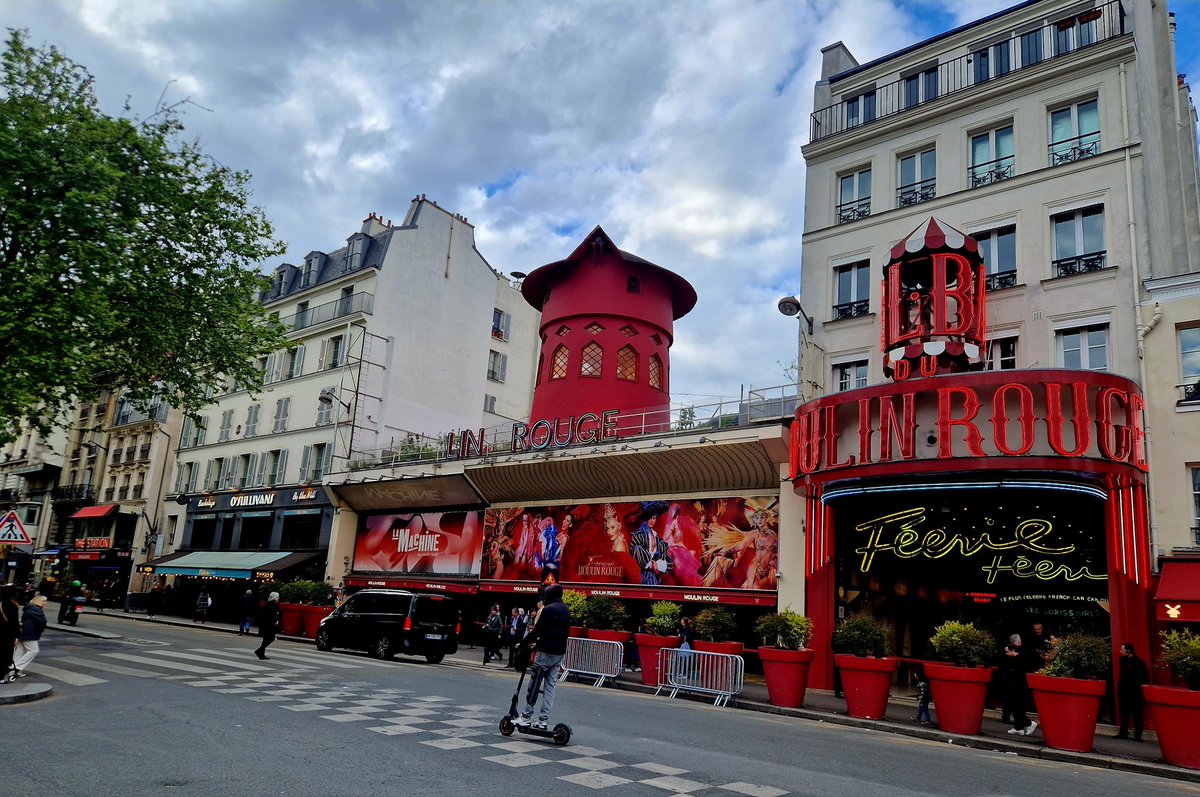 'April in Paris, chestnuts in blossom Holiday tables under the trees.' & Lin Rouge with fallen blades.