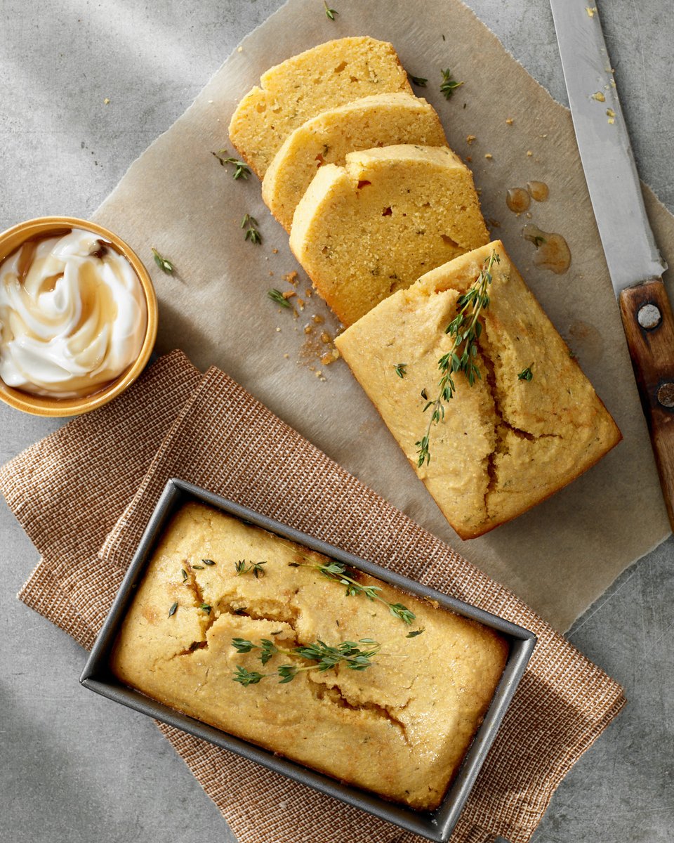 Classic cornbread with the addition of fresh thyme. Served with honey sour cream for a different kind of appetizer or as the perfect side to a bowl of soup, stew or chili! bit.ly/3VmRbU8