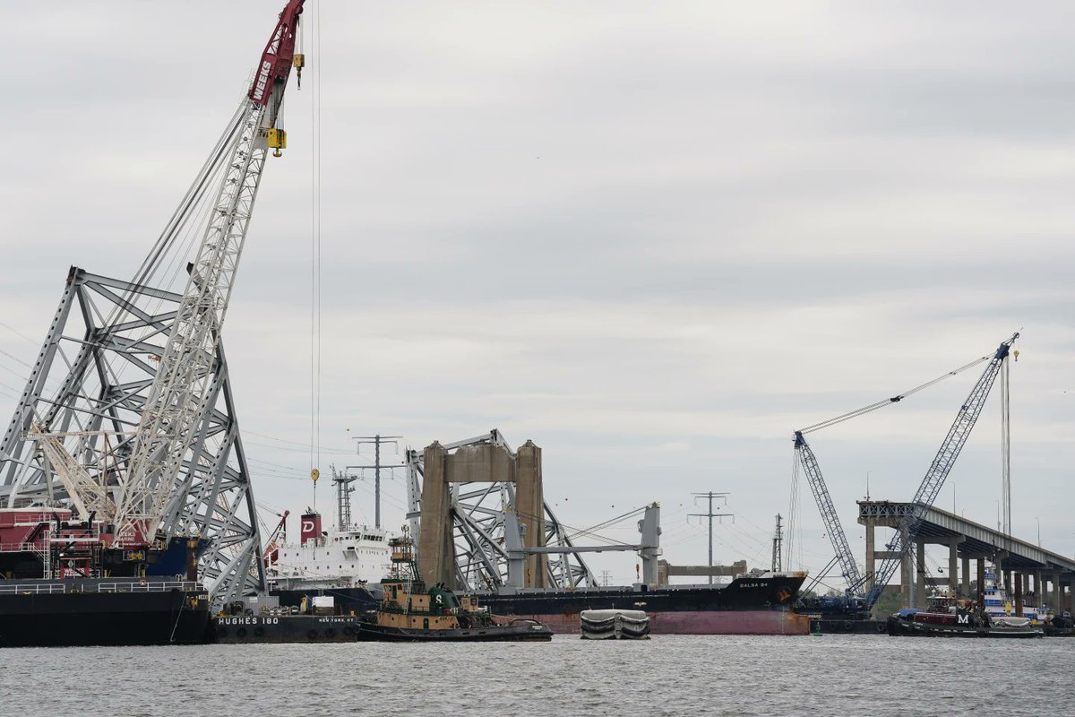 New deep-water channel allows first ship to pass Key bridge wreckage in Baltimore. 5 vessels that have been stranded for weeks are expected to leave Baltimore through the new, temporary channel. Other ships are scheduled to enter the port. bit.ly/4aTsyDw @Lea_Skene @AP