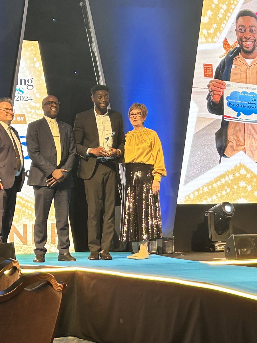 MST Chair  @trevorsterl delighted to present the Mary #Seacole Award for Outstanding Contribution to #Diversity and Inclusion with @Liz_HEE of #NHS England at the Student Nursing Times Awards.Congratulations to Oriyomi Aminu of the Northern Care Alliance NHS Foundation #SNTA