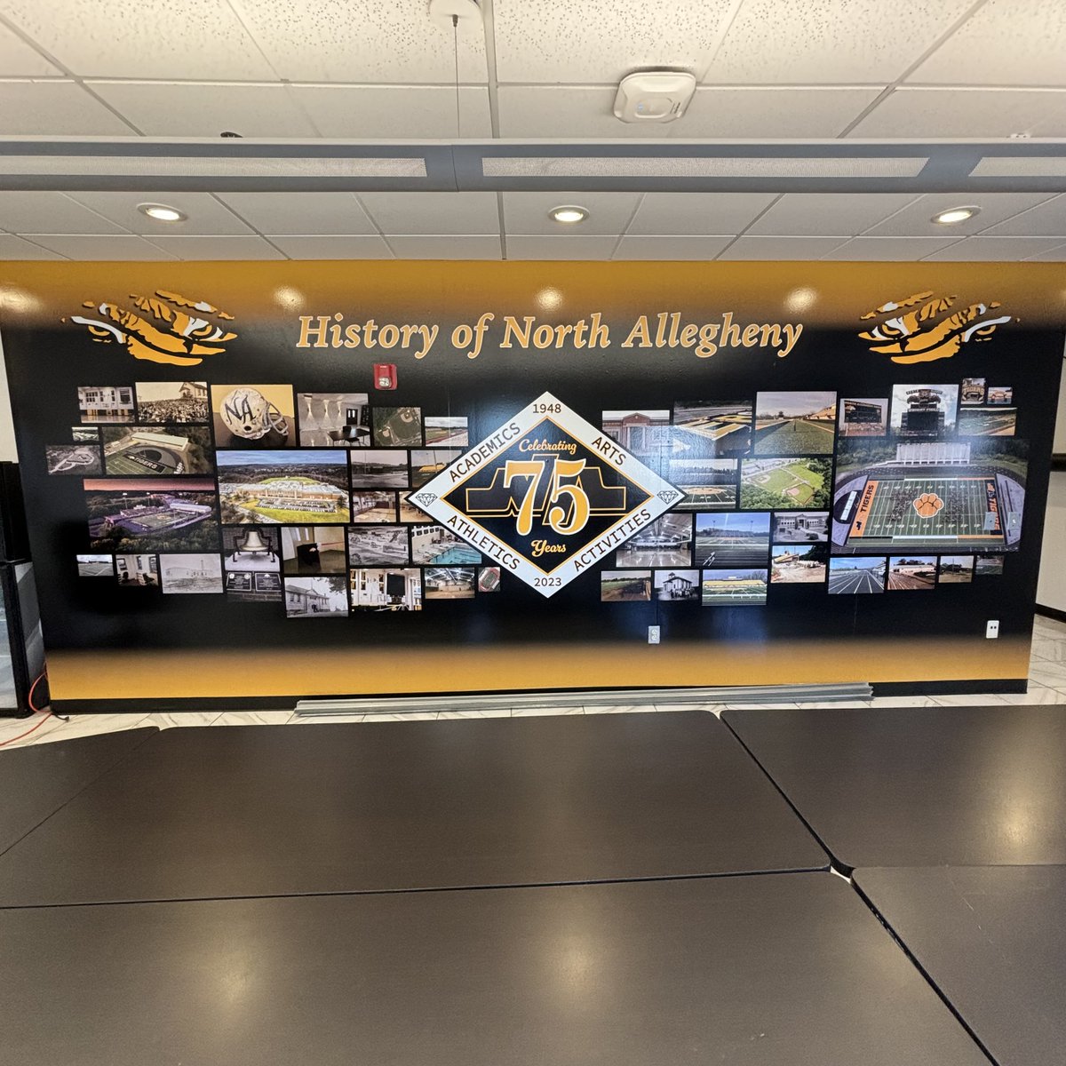 North Allegheny Athletics made some updates to a room in the Baierl Center. Our part included this large wall mural honoring the 75th Anniversary and framed photos of athletes.

#spark #signs #signage #signcompany #wallmural