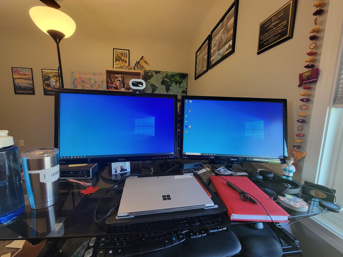 My office for the day. Working from home amidst prepping for the impending arrival of our visitors for the Great Lakes Process Systems Engineering Student Workshop I'm organizing. I'm excited that the surface is cooperative with dual screen mode again.